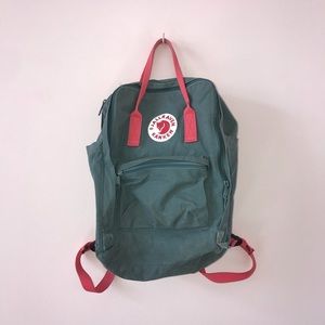 green & pink fjallraven kanken backpack